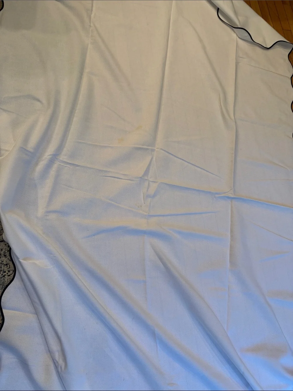 White vintage Scalloped Edge table cloth 113”x57” with matching napkins.